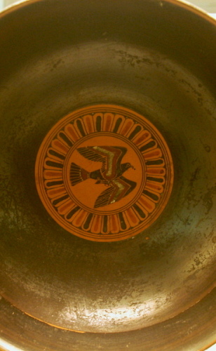Black-figured lip-cup with a flying bird inside; Athens c.540BC. From Camirus, Rhodes. Photographed
        by Gavin Duley at the British Museum